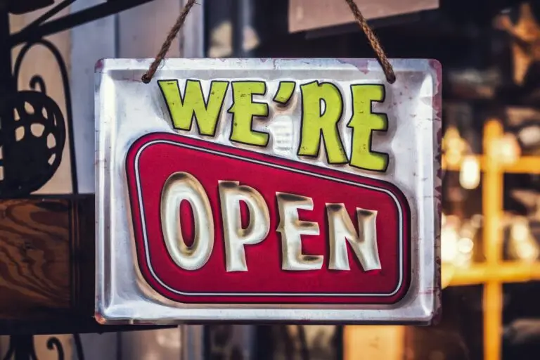Bright sign indicating the store is open.