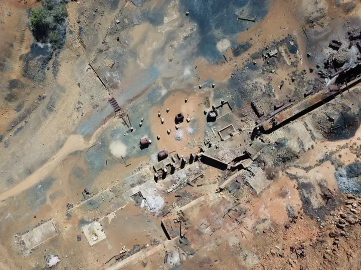 Aerial view of a desolate mining site.