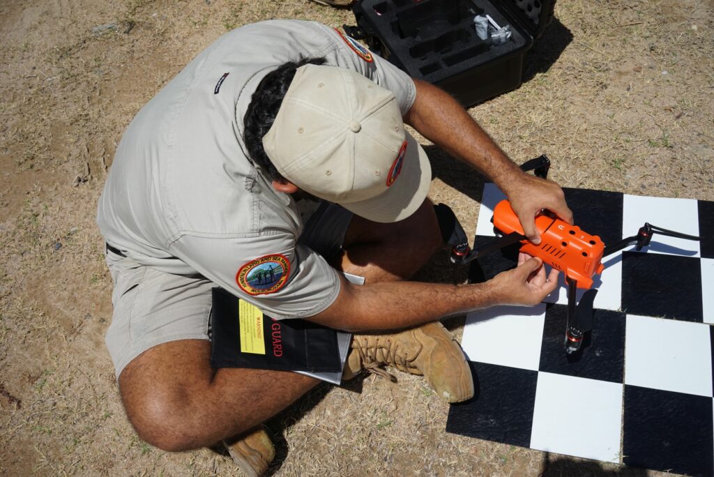 Getting set up to drone map with an Autel drone, landing mat, and LiPo battery bags