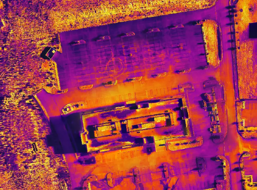 Aerial thermal view of a parking lot.