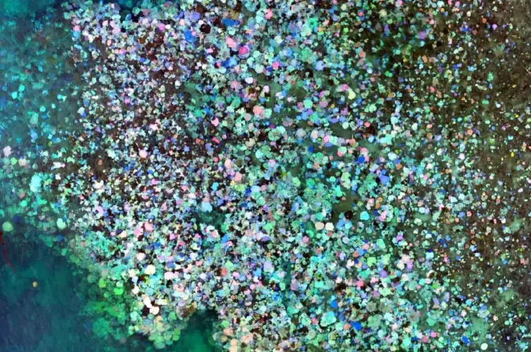 Colorful abstract pattern resembling confetti on water