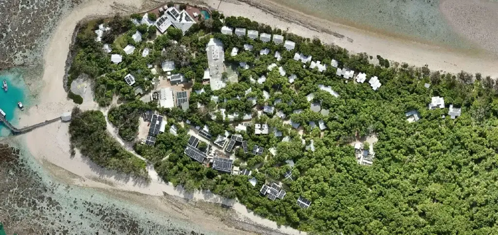 Aerial view of a lush island resort.