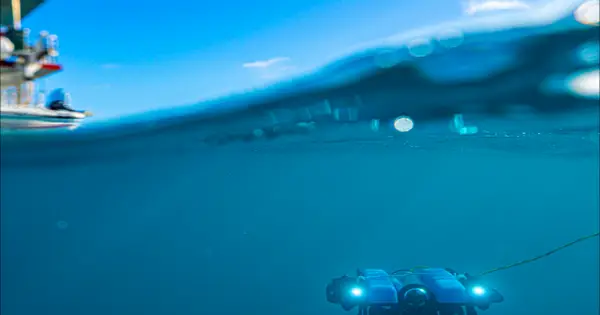 Underwater drone exploring the ocean surface.