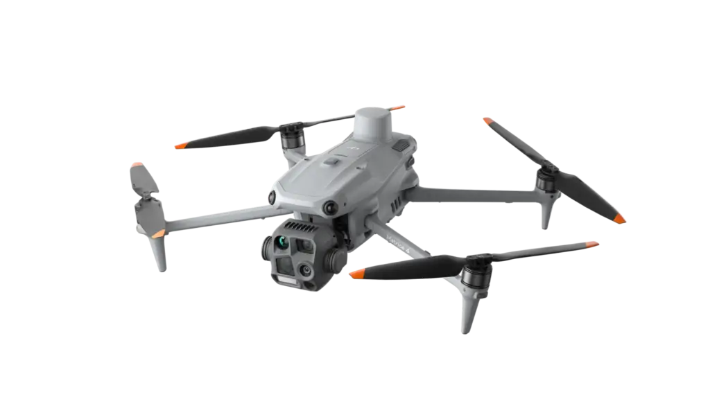 High-tech grey drone with four propellers.